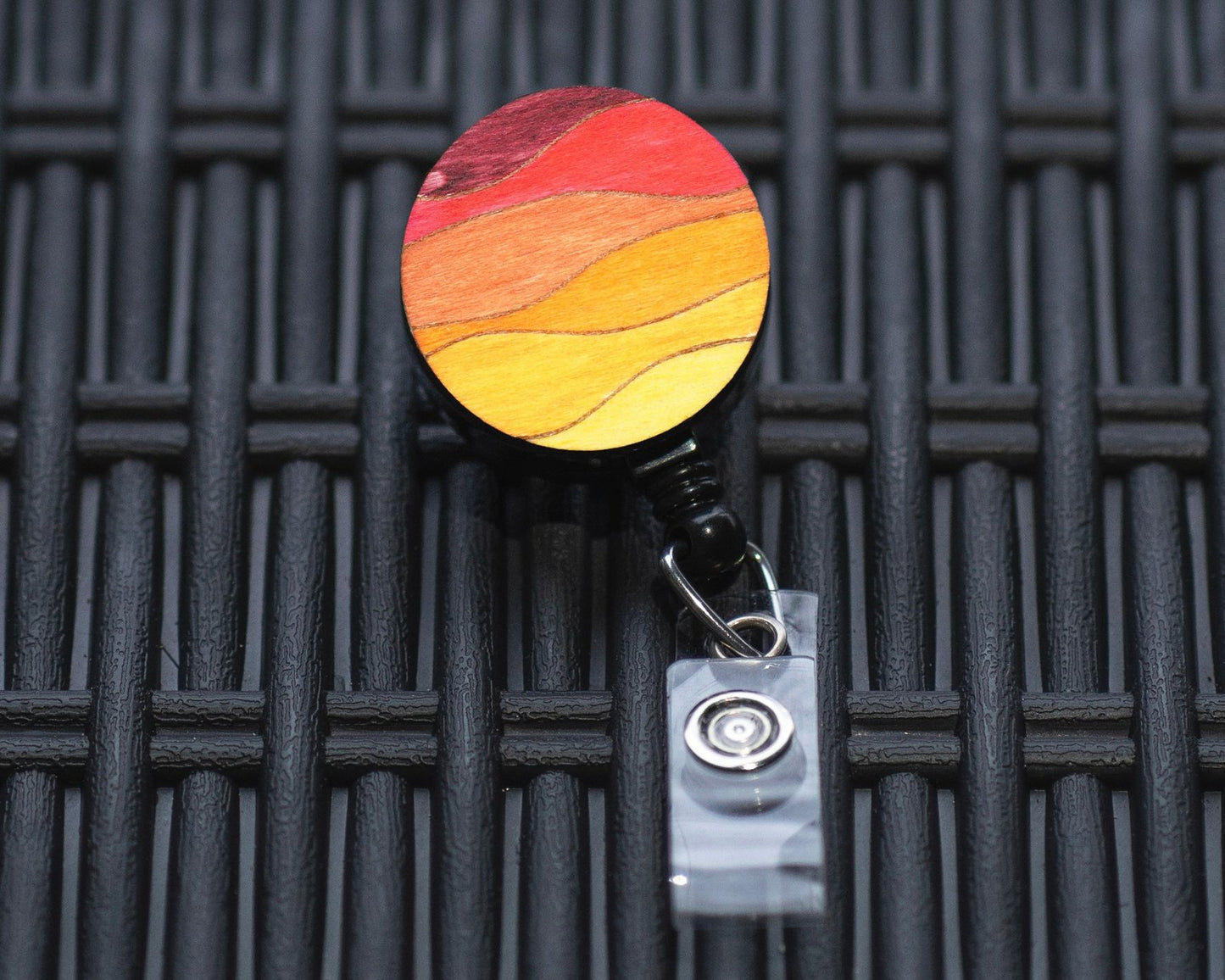 Red Wavy Lines Badge Reel | 21C