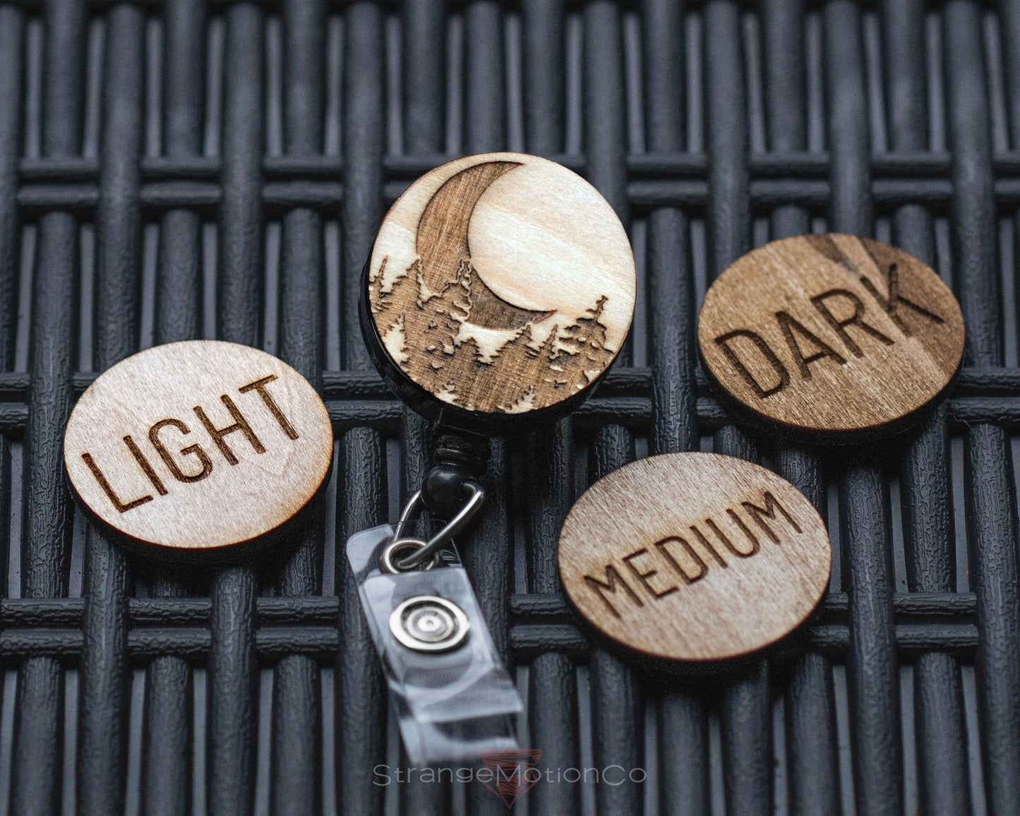 Moon and Trees Badge Reel  15 – Strange Motion Limited Co